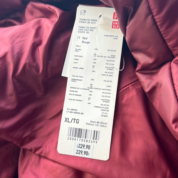 New with defect. Uniqlo seamless down parka Sz XL - Picture 2 of 2